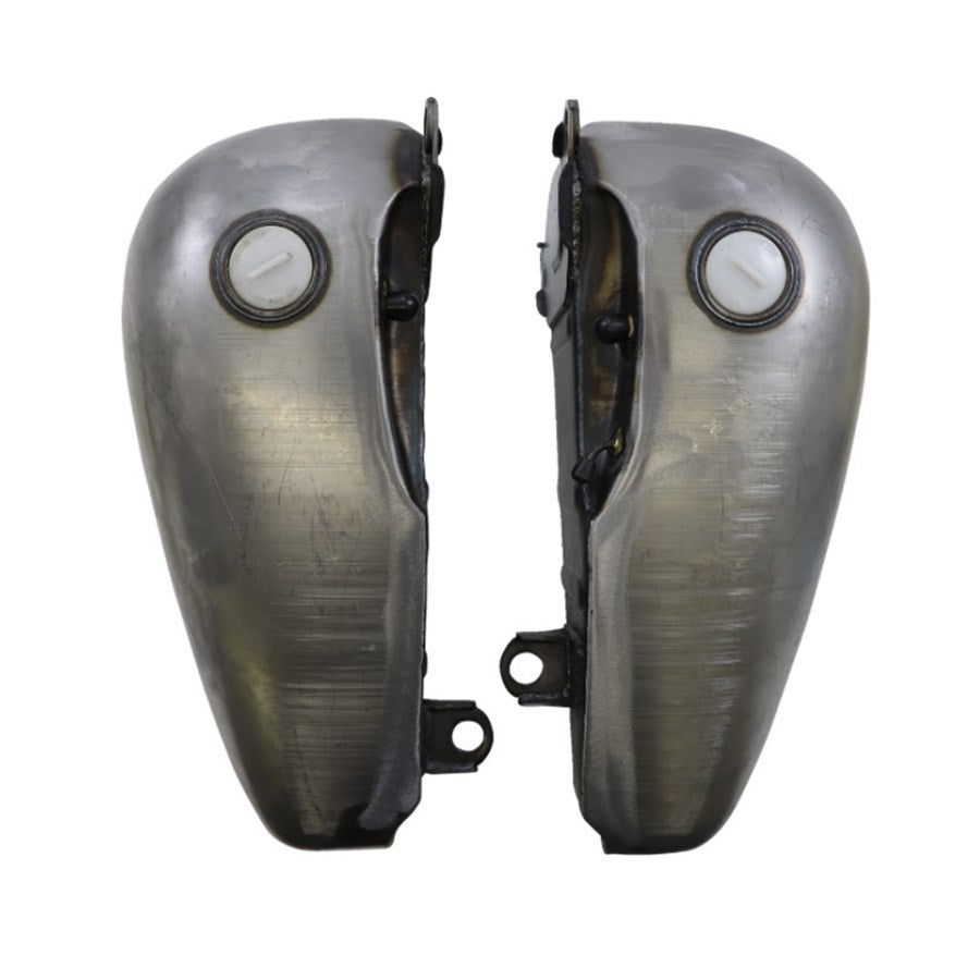 A pair of Fat Bob-style motorcycle exhausts with two holes in them.