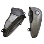 Two metallic flat side gas tanks with visible weld marks, positioned side by side and each topped with a round white cap—these are the Fat Bob-Style Gas Tank - 5 Gallon from Drag Specialties, capturing the classic Harley-Davidson Softail aesthetic while delivering robust performance and enduring style.