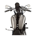 Two metallic flat side gas tanks with visible weld marks, positioned side by side and each topped with a round white cap—these are the Fat Bob-Style Gas Tank - 5 Gallon from Drag Specialties, capturing the classic Harley-Davidson Softail aesthetic while delivering robust performance and enduring style.
