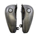 A pair of Fat Bob-style motorcycle exhausts with two holes in them.