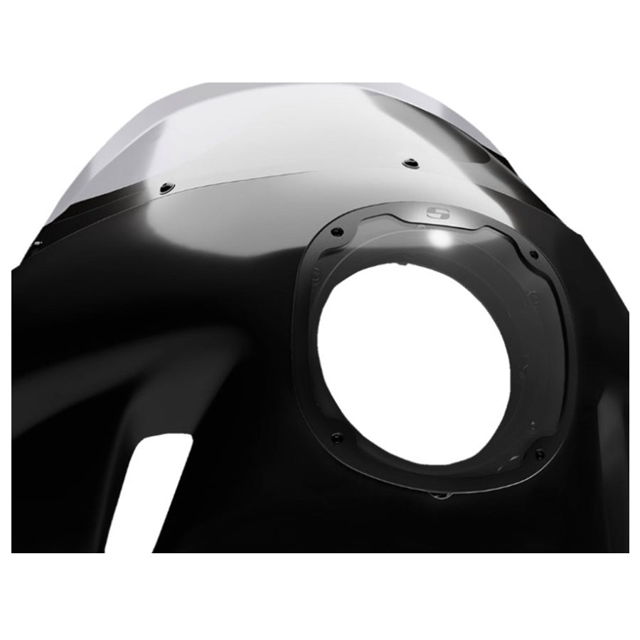 The Saddlemen Mini Fairing for '18-'23 Softail and '04-'21 Sportster, constructed with durable ABS by Saddlemen, features an open circular headlight hole and additional cutouts designed to enhance wind protection and streamline your bike.