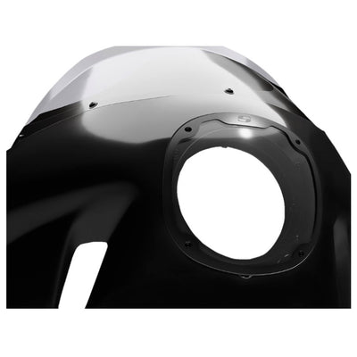 Black motorcycle front fairing with a clear windshield and a circular headlight opening, designed for Dyna Models. Offering excellent wind protection, this Saddlemen Mini Fairing - For 2006-2017 Dyna Models is both stylish and functional.