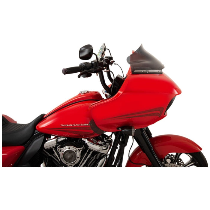 Red touring motorcycle with hard saddlebags and Klockwerks Flare Windshield - 9" - Dark Smoke, isolated on a white background.