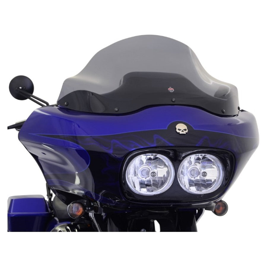 Close-up of the rear side and tailpiece of a blue sport motorcycle with a Klockwerks Flare Windshield - 12" - Dark Smoke - For 1998-2013 FLTR isolated on a white background.