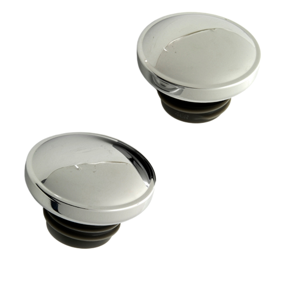 Two round, silver-colored sink stoppers with black rubber bases are shown on a white background, resembling a Wyatt Gatling Fuel Cap Set for L1996-Up Harley-Davidson with vented and non-vented caps by Wyatt Gatling.