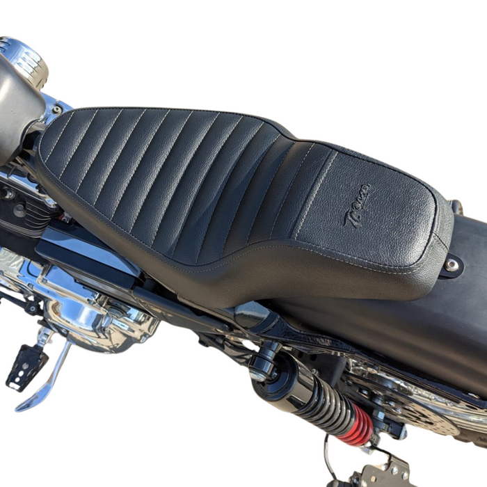 The TC Bros. Tracker Seat for Harley-Davidson Sportster 1986-2003 by TC Bros. is shown above a partially visible Sportster motorcycle.