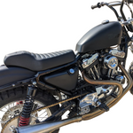 The TC Bros. Tracker Seat for Harley-Davidson Sportster 1986-2003 by TC Bros. is shown above a partially visible Sportster motorcycle.
