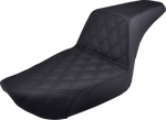 The Saddlemen Step-Up Seat for 1996-2003 Harley-Davidson Dyna is shown with other Saddlemen seats in black and brown, highlighting diverse designs and textures against a white background.