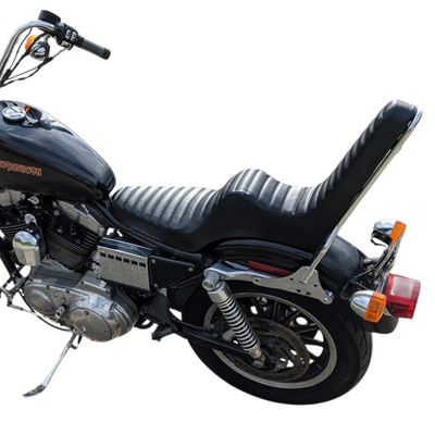 Shown are two black TC Bros. King & Queen Hardtail Seats for Harley-Davidson Sportster 1994-2003, ideal for pairing with a TC Bros. sissy bar, and designed specifically to fit your Sportster model.