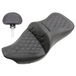 The Saddlemen Extended Reach Road Sofa Seat for 2008-2025 Harley-Davidson Touring features a sleek black design with a diamond-stitched pattern, raised backrest, and smooth edges. Crafted by Saddlemen for two riders, this seat combines comfort and classic Harley-Davidson style.