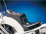 Black Le Pera Signature II 1-Piece Seat on a white bike with chrome details against a blue gradient background.
