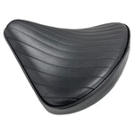 The Black Tuck and Roll Chopper Solo Seat by Moto Iron® features classic horizontal stitching and a contoured design for comfort and style—shown angled on a white background. A premium accessory for your custom ride.