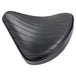 The Black Tuck and Roll Chopper Solo Seat by Moto Iron® features classic horizontal stitching and a contoured design for comfort and style—shown angled on a white background. A premium accessory for your custom ride.
