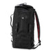 The Burly Voyager Motorcycle Sissy Bar Backpack by Burly is available in black and crafted from durable Black Cordura. It features multiple compartments, a buckled front pocket, and additional side handles. The backpack is also equipped with a MOLLE system for versatile attachment options.