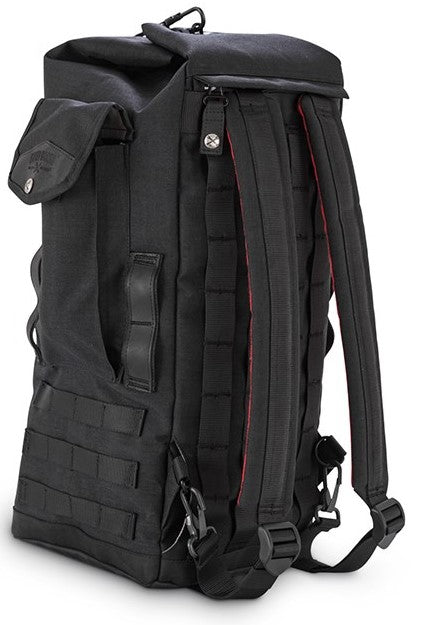 The Burly Voyager Motorcycle Sissy Bar Backpack by Burly is available in black and crafted from durable Black Cordura. It features multiple compartments, a buckled front pocket, and additional side handles. The backpack is also equipped with a MOLLE system for versatile attachment options.