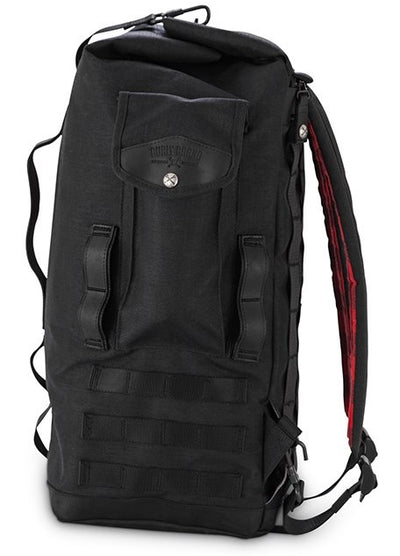 The Burly Voyager Motorcycle Sissy Bar Backpack by Burly is available in black and crafted from durable Black Cordura. It features multiple compartments, a buckled front pocket, and additional side handles. The backpack is also equipped with a MOLLE system for versatile attachment options.