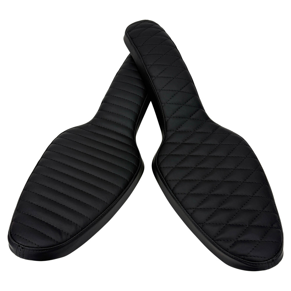 Two black, quilted Sully's Customs Cobra Seats for 1982-2003 Harley-Davidson Sportster featuring diamond stitching are crossed on a white background—perfect for upgrading your bike’s comfort and style.