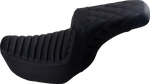 The Saddlemen Step-Up Seat for 2006-2017 Harley-Davidson Dyna features a diamond-stitched pattern, contoured design, and built-in lumbar support. Shown against a white background. Brand: Saddlemen.
