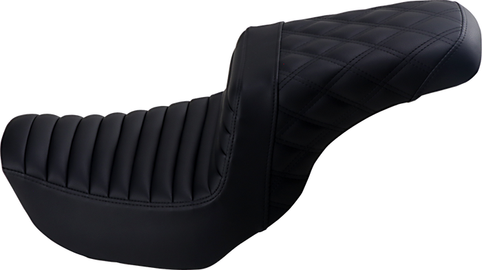 The Saddlemen Step-Up Seat for 2006-2017 Harley-Davidson Dyna features a diamond-stitched pattern, contoured design, and built-in lumbar support. Shown against a white background. Brand: Saddlemen.