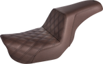 The Saddlemen Step-Up Seat for 2006-2017 Harley-Davidson Dyna features a diamond-stitched pattern, contoured design, and built-in lumbar support. Shown against a white background. Brand: Saddlemen.