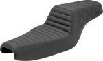 The Saddlemen Step-Up Seat for 2004-2022 Harley-Davidson Sportster (2.2/3.3 gal tank) features diamond-patterned black stitching, a raised rider section, and lower passenger area for enhanced lumbar support.