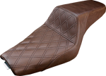 The Saddlemen Step-Up Seat for 2004-2022 Harley-Davidson Sportster (2.2/3.3 gal tank) features diamond-patterned black stitching, a raised rider section, and lower passenger area for enhanced lumbar support.