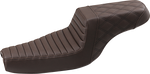 The Saddlemen Step-Up Seat for 2004-2022 Harley-Davidson Sportster (2.2/3.3 gal tank) features diamond-patterned black stitching, a raised rider section, and lower passenger area for enhanced lumbar support.