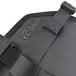 The TC Bros. Tool Roll by TC Bros. is a black and red zippered organizer case with compartments, ideal for motorcycles. MOLLE straps offer added versatility. TOOLS NOT INCLUDED.
