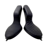 Two black Sully's Customs Camel Back Seats for Hardtail—one with diamond-quilted stitching, another with horizontal lines—are displayed side by side, offering stylish upgrade options from Sully's Customs.