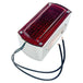 A rectangular red Box Style Chopper Tail Light with a chrome border and exposed black wires for electrical connection, reminiscent of a design by Wyatt Gatling.
