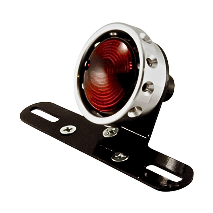 The Mid-USA Vintage Drilled Tail Light features a round design with a red lens and aluminum housing in silver, black, or gold. Each mounts on a black bracket with two screw holes and works with a 12V dual-filament bulb for reliable performance.
