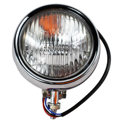 A Moto Iron® 4" Chopper Headlight - Chrome Clear Lens with a halogen bulb on a white background.