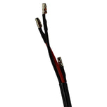 A pair of Moto Iron® 4" Chopper Headlight - Black Amber Lens wires on a white background.