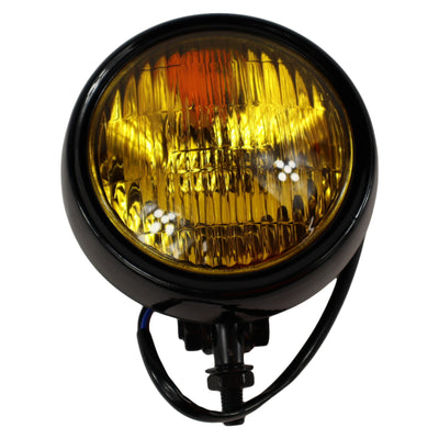 A Moto Iron® 4" Chopper Headlight - Black Amber Lens with a black powdercoat finish and a yellow reflector.