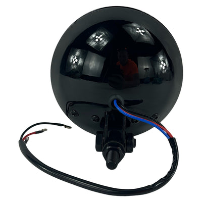 A Moto Iron® 4" Chopper Headlight - Black Amber Lens, with a wire attached to it, featuring a powdercoat finish.