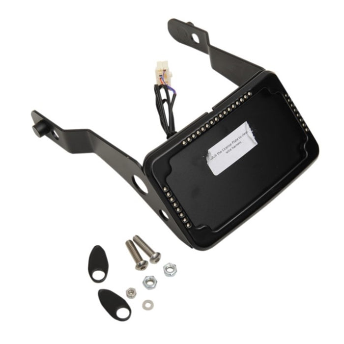 A black metal device mount with attached wires, screws, washers, and two small plate components arranged beside it on a white background; the setup resembles a Cycle Visions LP Plate Frame & Mount with Signals - For 2013-2017 FXDB - Black.