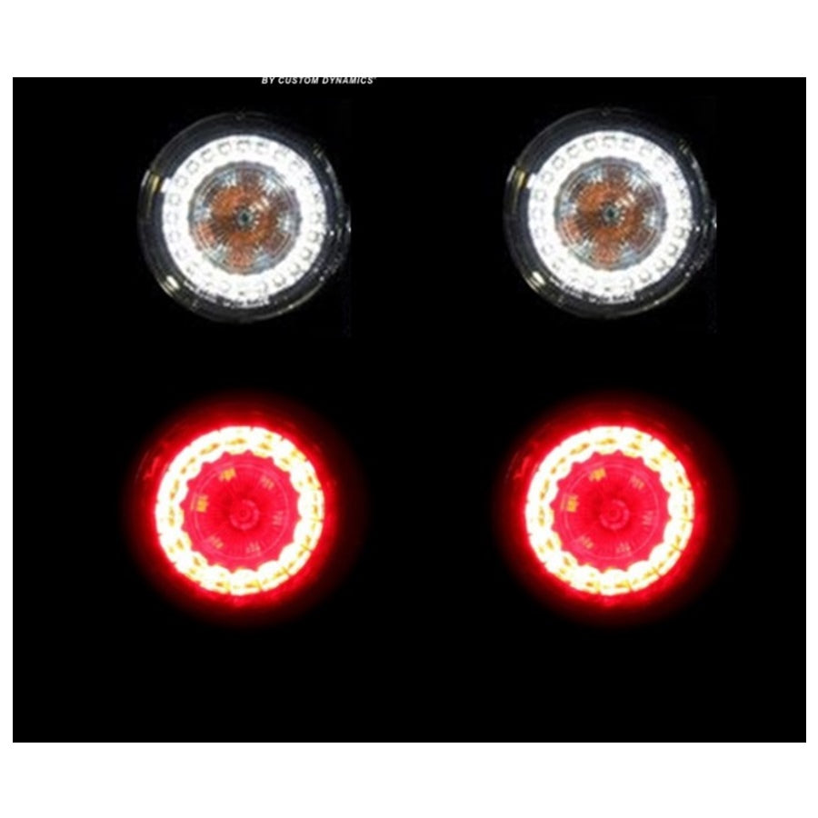 Four ProBEAM® Turn Signal Kits - BCM For '11'-17 Big Twin '18 - '23 M8 Softail '12-'17 FXD displayed in pairs: two red tail lights at the top and two black-rimmed LED headlights with amber LED turn signal conversion details at the bottom.