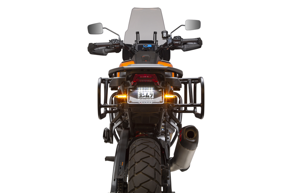 Close-up of a Harley-Davidson Pan America equipped with a Yoshimura Fender Eliminator Kit, featuring the taillight, license plate holder with “Yoshimura” branding, and dual round signal lights.