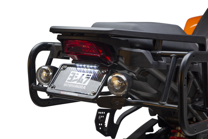 Close-up of a Harley-Davidson Pan America equipped with a Yoshimura Fender Eliminator Kit, featuring the taillight, license plate holder with “Yoshimura” branding, and dual round signal lights.