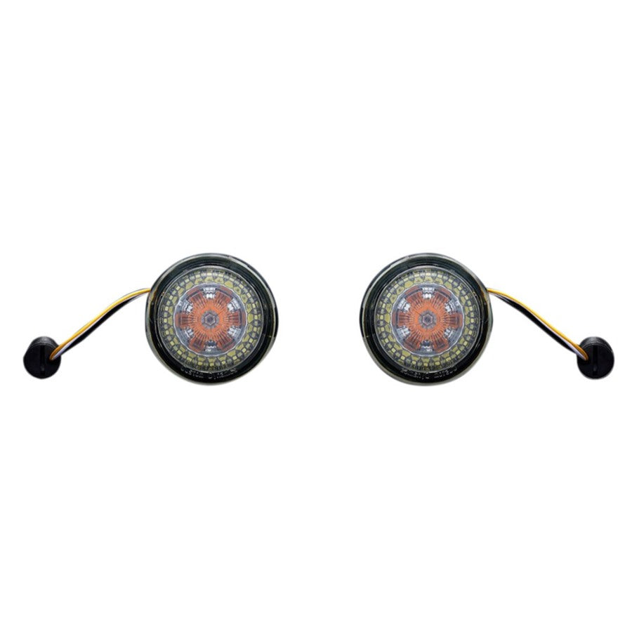 Two circular, intricately designed objects with attached wired handles, possibly speakers or decorative items, displayed against a white background. They resemble the sleek design of ProBEAM® Amber/White Dynamic Ringz™ Turn Signal Inserts by Custom Dynamics for Harley XL, FX, and FL models, bringing to mind high-tech aesthetics.