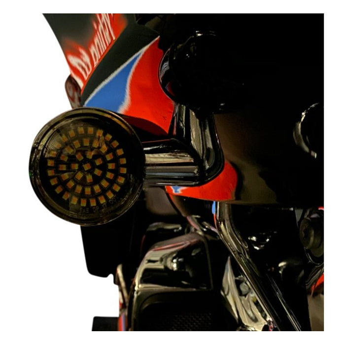 Two Genesis® 4 Amber/White LED Turn Signal Inserts, from Custom Dynamics, each with a wire harness attached, are ideal as plug-and-play front turn signals for your Harley XL, FX, and FL models.