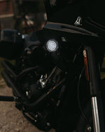 Two Genesis® 4 Amber/White LED Turn Signal Inserts, from Custom Dynamics, each with a wire harness attached, are ideal as plug-and-play front turn signals for your Harley XL, FX, and FL models.