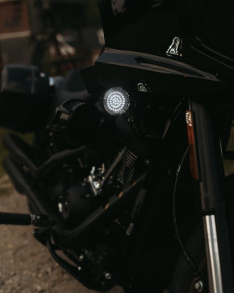 Two Genesis® 4 Amber/White LED Turn Signal Inserts, from Custom Dynamics, each with a wire harness attached, are ideal as plug-and-play front turn signals for your Harley XL, FX, and FL models.