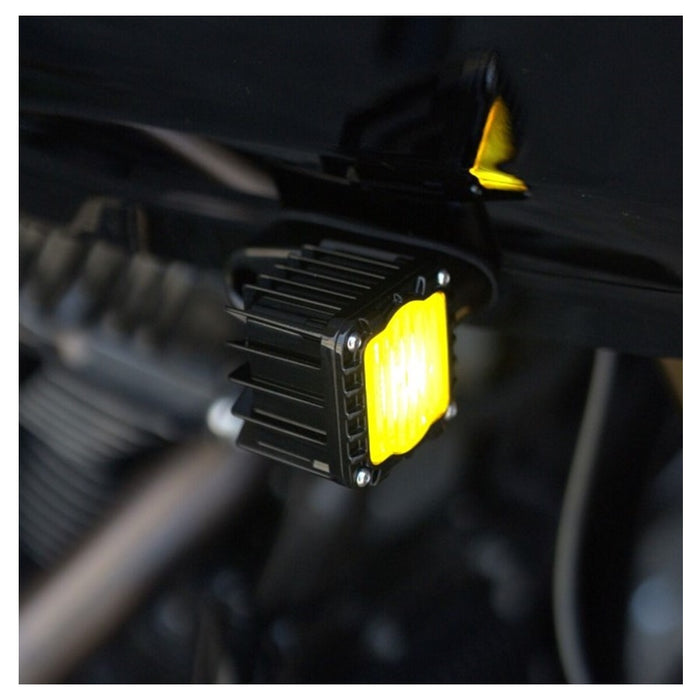 A pair of Custom Dynamics Shark Demon LED Turn Signals with black housing and yellow lenses, designed specifically for Harley &