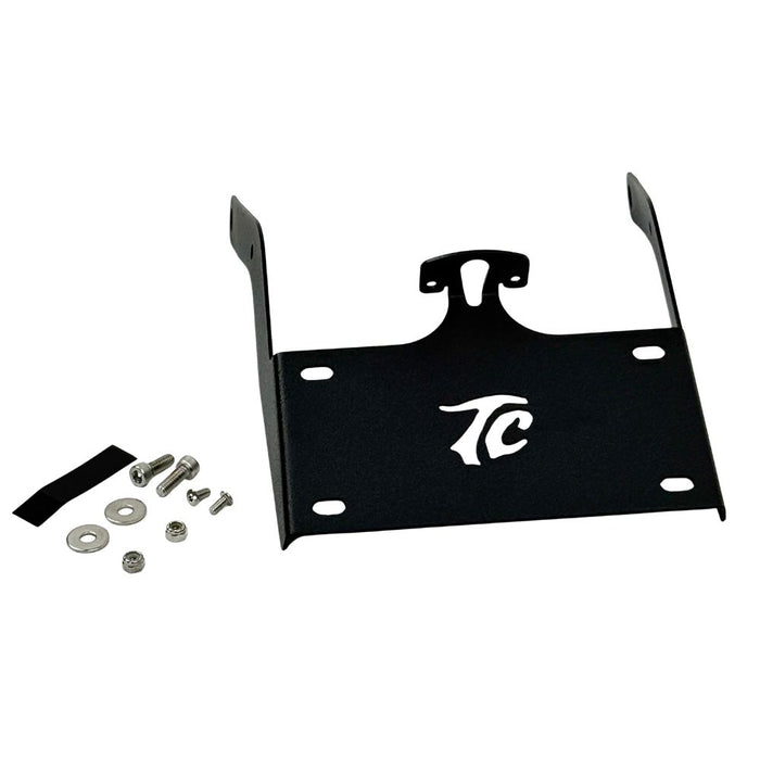 TC Bros. License Plate Relocation Bracket for 2022-Up Harley-Davidson Nightster RH975, with logo, includes screws, washers, nuts, bolt, and a black rectangular piece—all neatly arranged on a white background.