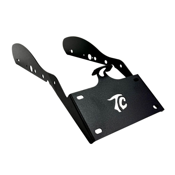 Black metal TC Bros. License Plate Relocation Bracket for 2010-2022 Harley-Davidson Sportster with mounting hardware for saddlebag installation.