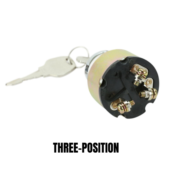Three Moto Iron® metal ignition switches, including the Moto Iron Universal Ignition Switch, are arranged diagonally on a white background. Each switch displays exposed terminals and comes with attached keys.