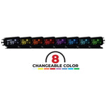 A digital car dashboard display shows a speed of 99 km/h along with engine and battery status indicators. The KOSO D2 Multifunction Meter 2018-2024 Harley M8 Softail also features a gear indicator and a programmable shift light, all branded with the Koso logo in the bottom right corner.