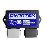 The Dynatek Programmable Digital Performance Ignition Module for 1999-2003 Harley Davidson Twin Cam TC88 features a blue and white label with two bottom connectors, offering programmable advance curves and customizable rev limiter settings for optimal performance.