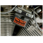 An ignition coil for an internal combustion engine, with a label warning it is not for use with solid-state ignition systems. Designed specifically for Big Twin Sportster FXD Models, the Dynatek Twin Fire II Miniature 3 Ohm Coil is a perfect fit.